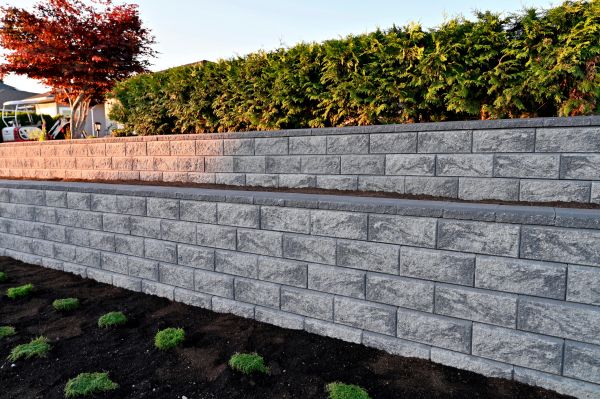 Concrete Retaining Wall Installation in Monument