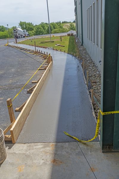 Concrete Sidewalk Paving in Monument